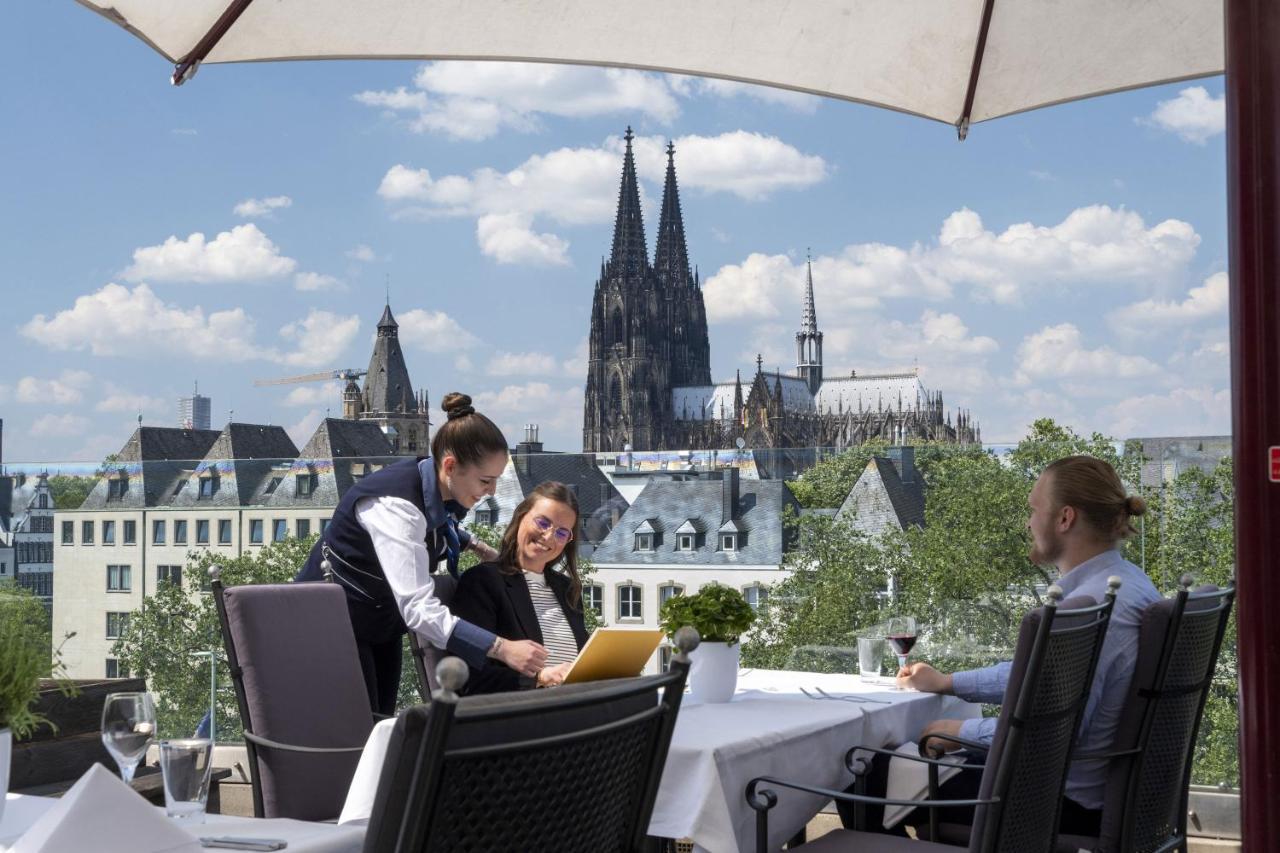 Maritim Hotel Koln Exterior foto The view from the terrace of the restaurant