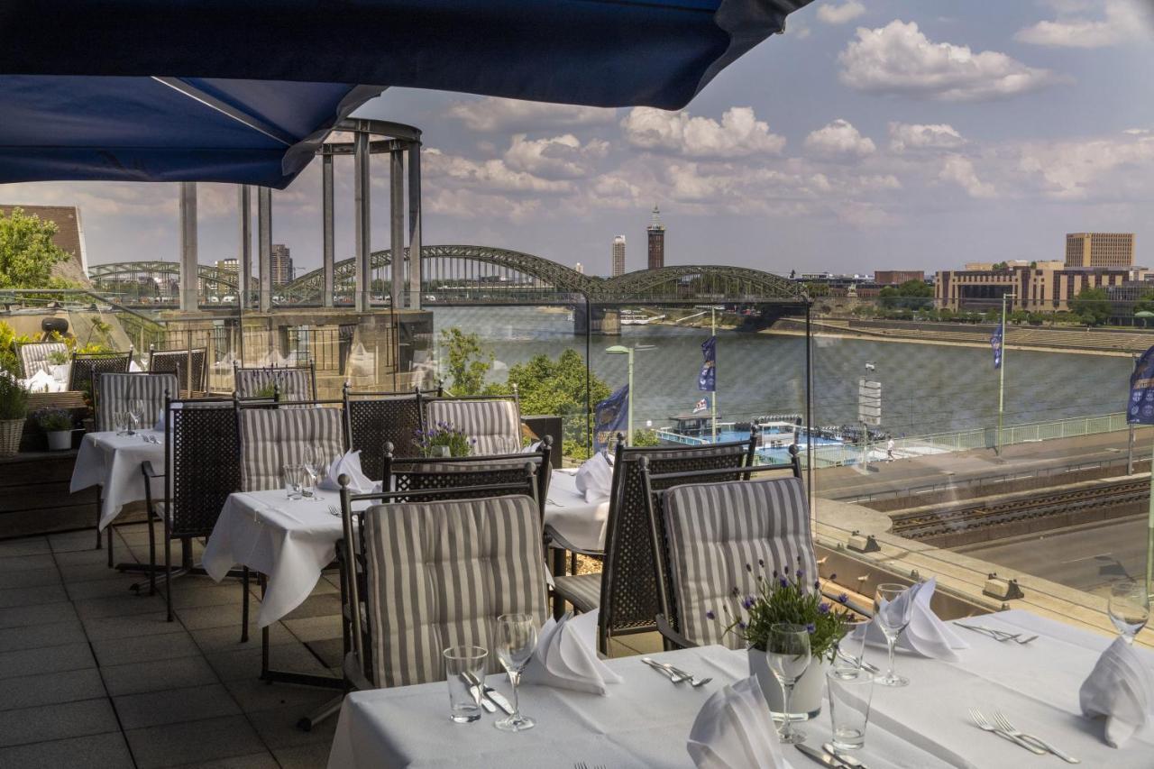 Maritim Hotel Koln Exterior foto The view from the restaurant